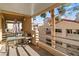 Relax on this covered balcony with patio table and views of the community at 3843 Desert Marina Dr # 232, Laughlin, NV 89029