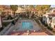Relaxing community pool with hot tub, lounging chairs and desert landscaping at 3843 Desert Marina Dr # 232, Laughlin, NV 89029