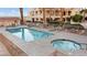 Inviting community pool with hot tub, lounge seating, and shaded seating area at 3843 Desert Marina Dr # 232, Laughlin, NV 89029