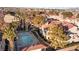 Inviting community pool area surrounded by lush landscaping and well-maintained buildings at 3843 Desert Marina Dr # 232, Laughlin, NV 89029
