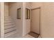 Neutral stairway and entry door with welcome mat at 3843 Desert Marina Dr # 232, Laughlin, NV 89029