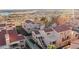 Exterior view of stucco townhomes with red tile roofs, with desert landscaping at 3843 Desert Marina Dr # 232, Laughlin, NV 89029