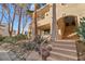 Attractive condo featuring a stucco exterior, desert landscaping, and private balconies at 3843 Desert Marina Dr # 232, Laughlin, NV 89029