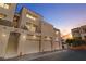 Inviting condo featuring private garage, charming balcony, and stucco facade at 3843 Desert Marina Dr # 232, Laughlin, NV 89029