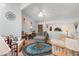 Cozy living room features neutral color palette, ceiling fan and adjacent dining area at 3843 Desert Marina Dr # 232, Laughlin, NV 89029