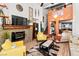 Bright and airy living room with a fireplace, comfortable seating, and staircase at 3843 Desert Marina Dr # 232, Laughlin, NV 89029