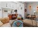 Open-concept living area with stylish furniture, a TV setup, and a unique rug enhancing the ambiance at 3843 Desert Marina Dr # 232, Laughlin, NV 89029