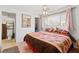 Bedroom showcasing a comfortable bed, bright windows, and a glimpse into the adjacent bathroom at 3843 Desert Marina Dr # 232, Laughlin, NV 89029