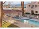 Enjoy the community pool and spa and desert scenery surrounding the property at 3843 Desert Marina Dr # 232, Laughlin, NV 89029