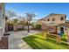 Backyard featuring well-maintained green space and play structure at 4108 Freel Peak Ct, Las Vegas, NV 89129