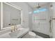 Elegant bathroom showcasing a sleek vanity, lighted mirror, and glass enclosed shower at 4108 Freel Peak Ct, Las Vegas, NV 89129