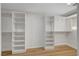 Walk-in closet with custom shelving and ample storage space at 4108 Freel Peak Ct, Las Vegas, NV 89129