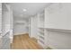 Spacious walk-in closet featuring custom built-in shelving and drawers at 4108 Freel Peak Ct, Las Vegas, NV 89129