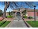 Inviting two-story home with a well-maintained lawn and decorative landscaping at 4108 Freel Peak Ct, Las Vegas, NV 89129