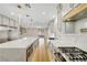 Gourmet kitchen featuring stainless appliances and large island, perfect for entertaining at 4108 Freel Peak Ct, Las Vegas, NV 89129