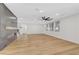 Large and well-lit living area featuring a modern fireplace, new flooring and stylish ceiling fan at 4108 Freel Peak Ct, Las Vegas, NV 89129