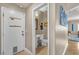 Well-lit bathroom with a sink, toilet, and decorative items, showing a clean and functional space at 4247 Jordanville St, Las Vegas, NV 89129