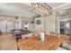 Open-concept living space with dining area, and sightlines to the kitchen and other gathering areas at 4247 Jordanville St, Las Vegas, NV 89129