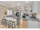Modern kitchen boasting granite countertops, grey cabinets, and stainless steel appliances at 4247 Jordanville St, Las Vegas, NV 89129