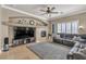 Inviting living room with a fireplace, modern furniture, and decorative accents at 4247 Jordanville St, Las Vegas, NV 89129