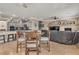 Open-concept living space with a kitchen, dining area, and comfortable seating, ideal for entertaining at 4247 Jordanville St, Las Vegas, NV 89129