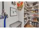Walk-in pantry featuring ample shelving for optimal storage and organization at 4247 Jordanville St, Las Vegas, NV 89129