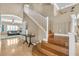 Beautiful staircase leading to the second floor, with views of the living area at 4247 Jordanville St, Las Vegas, NV 89129