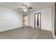 Spacious bedroom with wood-look floors and neutral decor offers a blank canvas for personalization at 4316 W Lake Mead Blvd # 202, Las Vegas, NV 89108