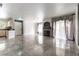 Bright living room with tile floors, modern fireplace, and elegant window treatments creates a stylish space at 4316 W Lake Mead Blvd # 202, Las Vegas, NV 89108