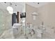 Modern bathroom with a marble floor, stylish fixtures, and a built-in TV at 4381 W Flamingo Rd # 1609, Las Vegas, NV 89103