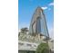 High-rise exterior shot showcasing architectural design and a sunny blue sky at 4381 W Flamingo Rd # 1609, Las Vegas, NV 89103