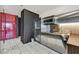 A compact kitchenette features stainless steel appliances, sleek cabinetry, and marble flooring at 4381 W Flamingo Rd # 1609, Las Vegas, NV 89103