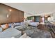 Bright living room with city views featuring hardwood floors and a modern kitchen at 4381 W Flamingo Rd # 1609, Las Vegas, NV 89103