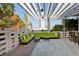 Stylish outdoor terrace featuring modern pergola, lounge seating, and bar area at 4381 W Flamingo Rd # 1609, Las Vegas, NV 89103