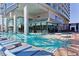 Resort-style pool with shallow areas and stylish lounge chairs for relaxation and sunbathing at 4381 W Flamingo Rd # 1609, Las Vegas, NV 89103