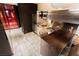 Kitchen and dining area featuring stainless steel appliances and modern cabinetry at 4381 W Flamingo Rd # 1809, Las Vegas, NV 89103
