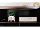 Decorated shelving unit featuring modern decor at 4381 W Flamingo Rd # 1809, Las Vegas, NV 89103