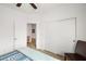 Bright bedroom featuring a ceiling fan, neutral carpet, and ample closet space at 5224 E San Palo Dr, Pahrump, NV 89061