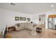 Spacious living room showcasing a large sectional couch and access to additional living spaces at 5224 E San Palo Dr, Pahrump, NV 89061