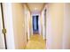 Hallway view showcasing neutral walls and a cohesive flooring design at 5260 Del Lago Dr, Las Vegas, NV 89130