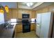Functional kitchen featuring ample cabinet space, a full appliance suite, and lots of natural light at 5260 Del Lago Dr, Las Vegas, NV 89130