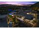 Luxury living in a gated community, featuring modern homes, meticulously landscaped grounds, and a sparkling pool at 535 Serenity Point Dr, Henderson, NV 89012