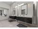Bright bathroom features dual vanities, modern fixtures, and a soaking tub with natural light at 535 Serenity Point Dr, Henderson, NV 89012