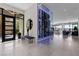 Contemporary foyer with unique lighting, wine cellar, and modern accents at 535 Serenity Point Dr, Henderson, NV 89012