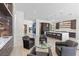 Open concept living space featuring a stylish bar area and gourmet kitchen at 535 Serenity Point Dr, Henderson, NV 89012