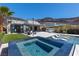 Modern outdoor space with a pool, spa, and patio area, perfect for relaxing and entertaining at 535 Serenity Point Dr, Henderson, NV 89012