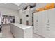 Luxury walk-in closet with center island, custom cabinets, shelves and drawers, and designer storage at 535 Serenity Point Dr, Henderson, NV 89012