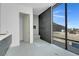 Modern bathroom features a step-in shower and large windows with exterior views at 563 Rock Peak Dr, Henderson, NV 89012
