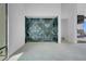 Bedroom with large windows and an accent wall, perfect for relaxing and unwinding at 563 Rock Peak Dr, Henderson, NV 89012