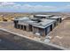Contemporary home design, ready for landscaping, with modern architectural elements at 563 Rock Peak Dr, Henderson, NV 89012